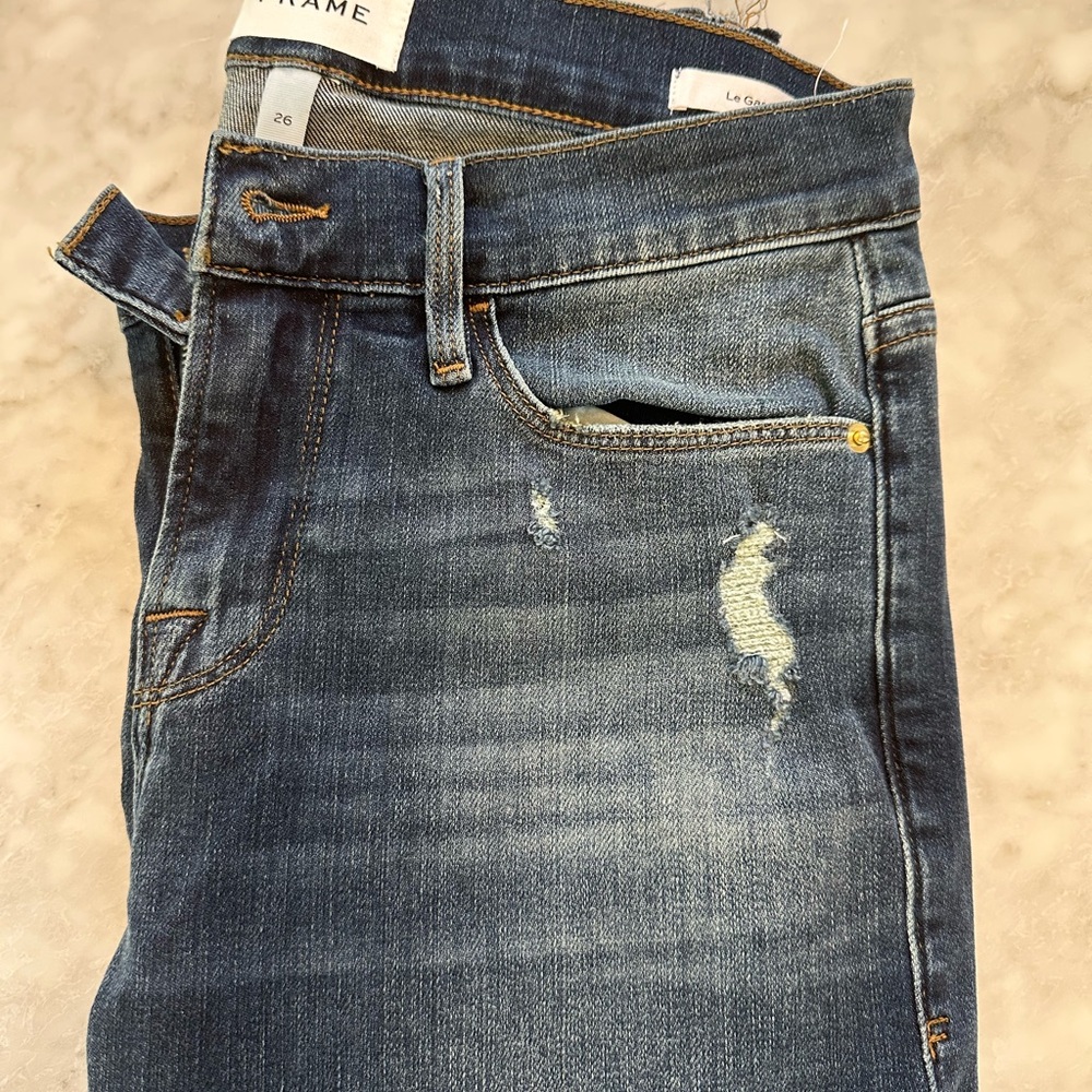 Like new FRAME Distressed Blue Jeans